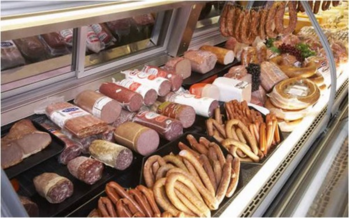 <p>a counter in a supermarket where you can get different types of cheese, cold cooked meat, prepared salads, etc.</p>