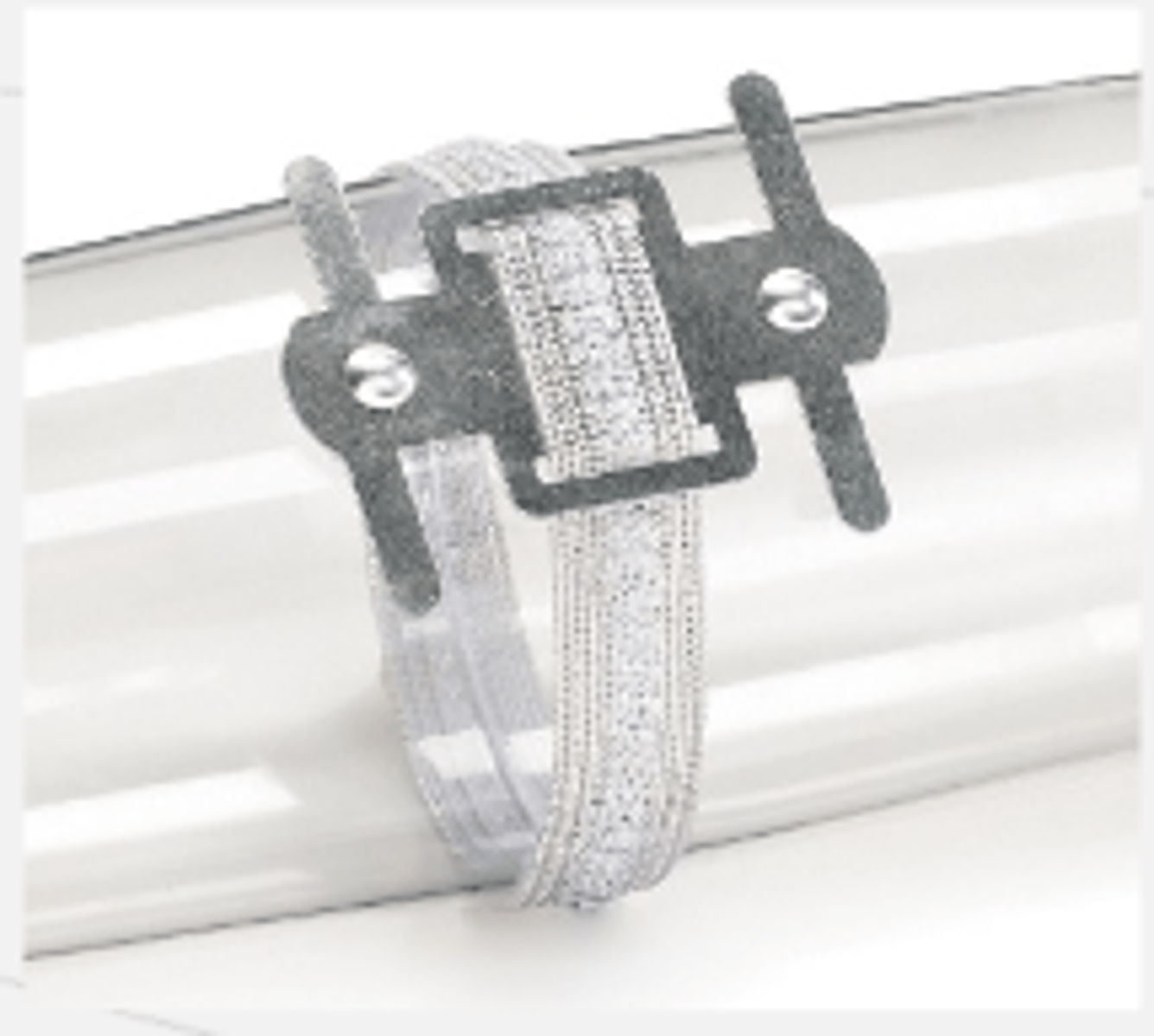 <p>holds the flower corsage on the wrist</p>