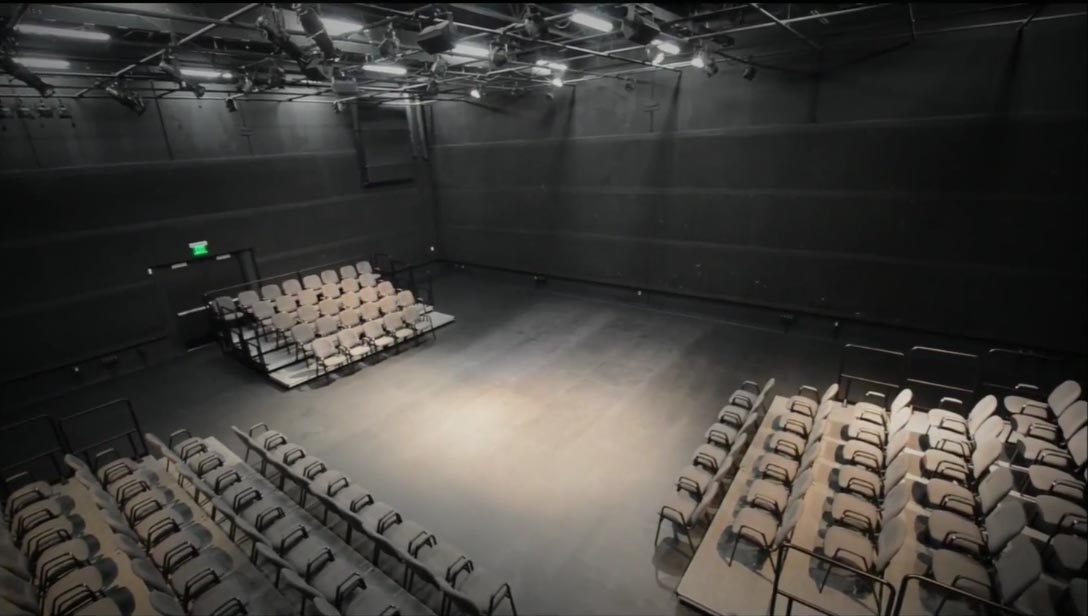 A small theatre, often painted black, the seating is flexible and can be rearranged into any shape or totally removed