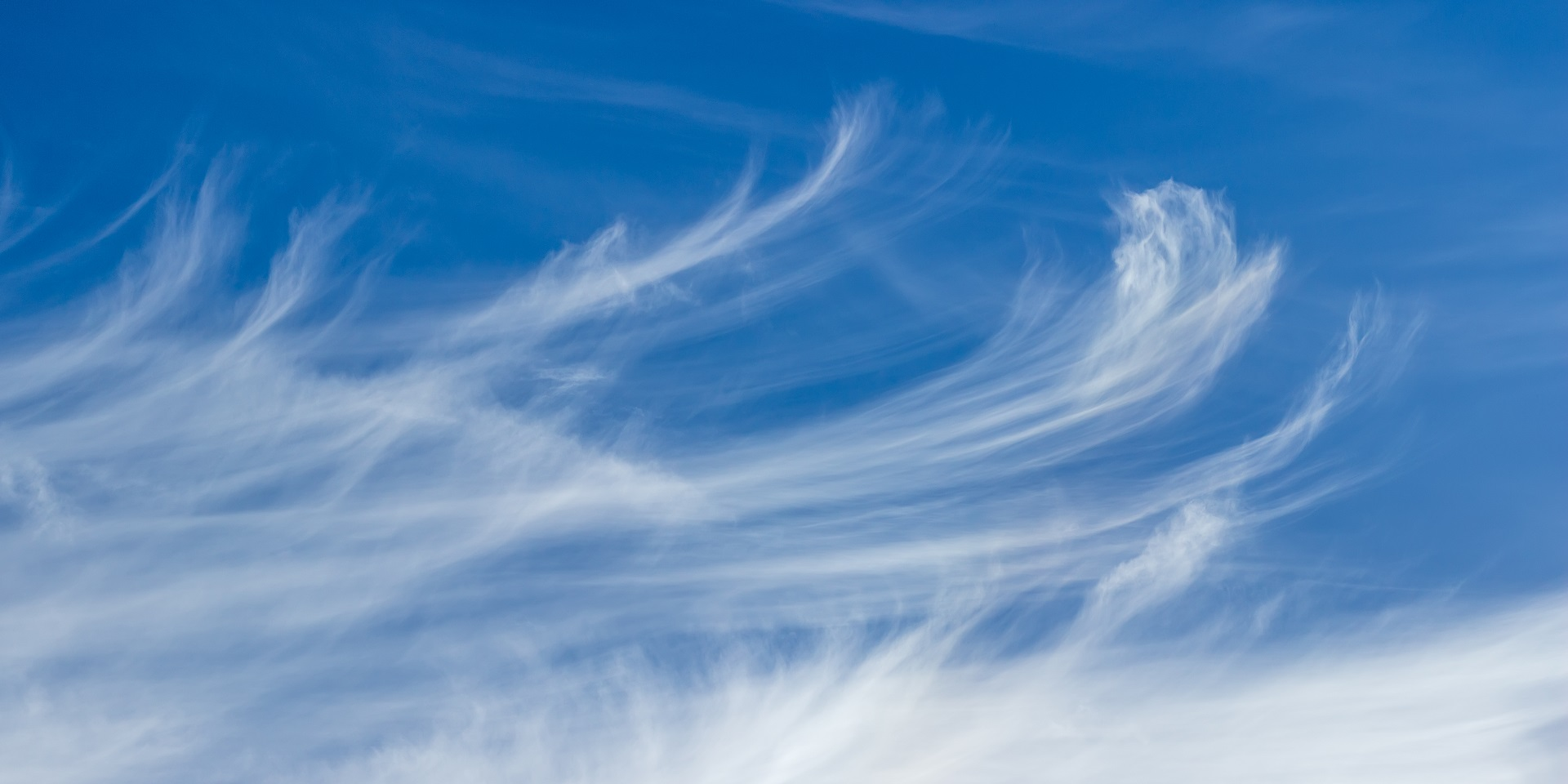 <p>high, wispy, icicles, whimsical, can produce halos around sun</p>