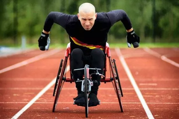 <p>What is illustrated by the dramatic imagery of athletes strapping up their joints and expressing strain?</p>