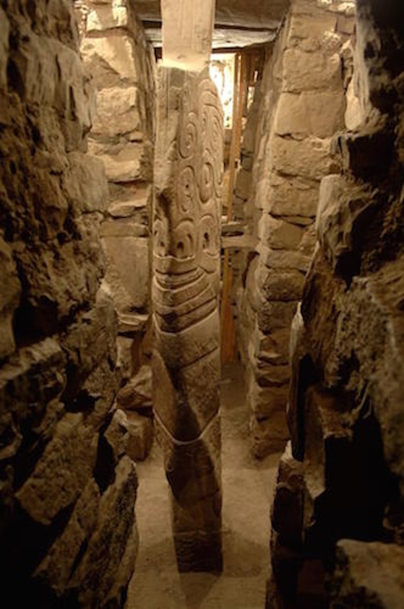 <p>Northern highlands, Peru</p><p>Chavin</p><p>900-200 BCE</p><p>Form: Granite</p><p>Function: Spanish for spear or blade. Shaped as a primary digging tool used by area farmers.</p><p>Standing at about 15 feet in height, the Lanzón is carved with a half human, half animal-like figure. The powerful image has a human-like body with snakes on the eyebrows, large fangs, and sharp talons for nails on the hands and feet. One hand is pointing up while the other is pointing down. Perhaps a symbol of the heavens and Earth. Chavín de Huántar is an ancient site that was once a bustling religious capital for the Chavín civilization</p>
