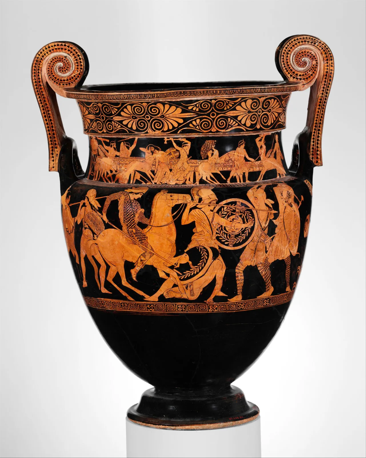 <p>Black surface with red/colored figures</p>