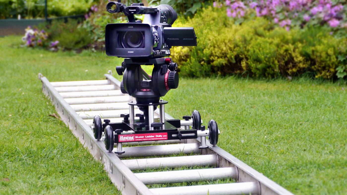 <p><strong>DOLLY SHOT</strong></p><p>Camera supports with wheels to facilitate tracking shots. May move on tracks hence ‘dolly shot.’</p>