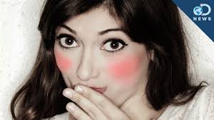 <p>turned red in the face, typically from embarrassment, shame, or shyness.<br></p>