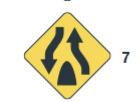 <p>divided highway begins/median will end soon</p>