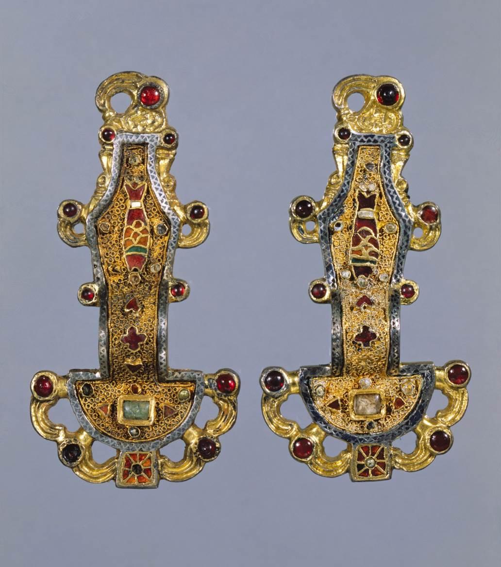 <p>Mid-sixth century C.E. Silver gilt worked in ligree, with inlays of garnets and other stones.</p>