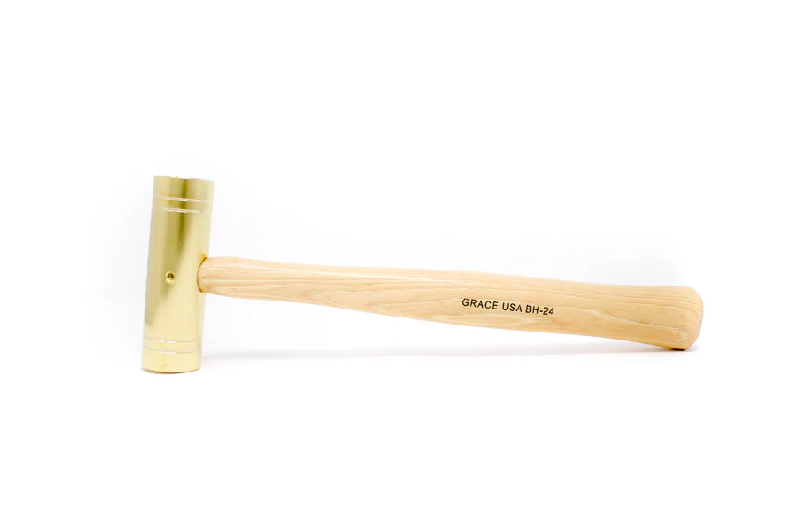 <p>brass hammer </p>