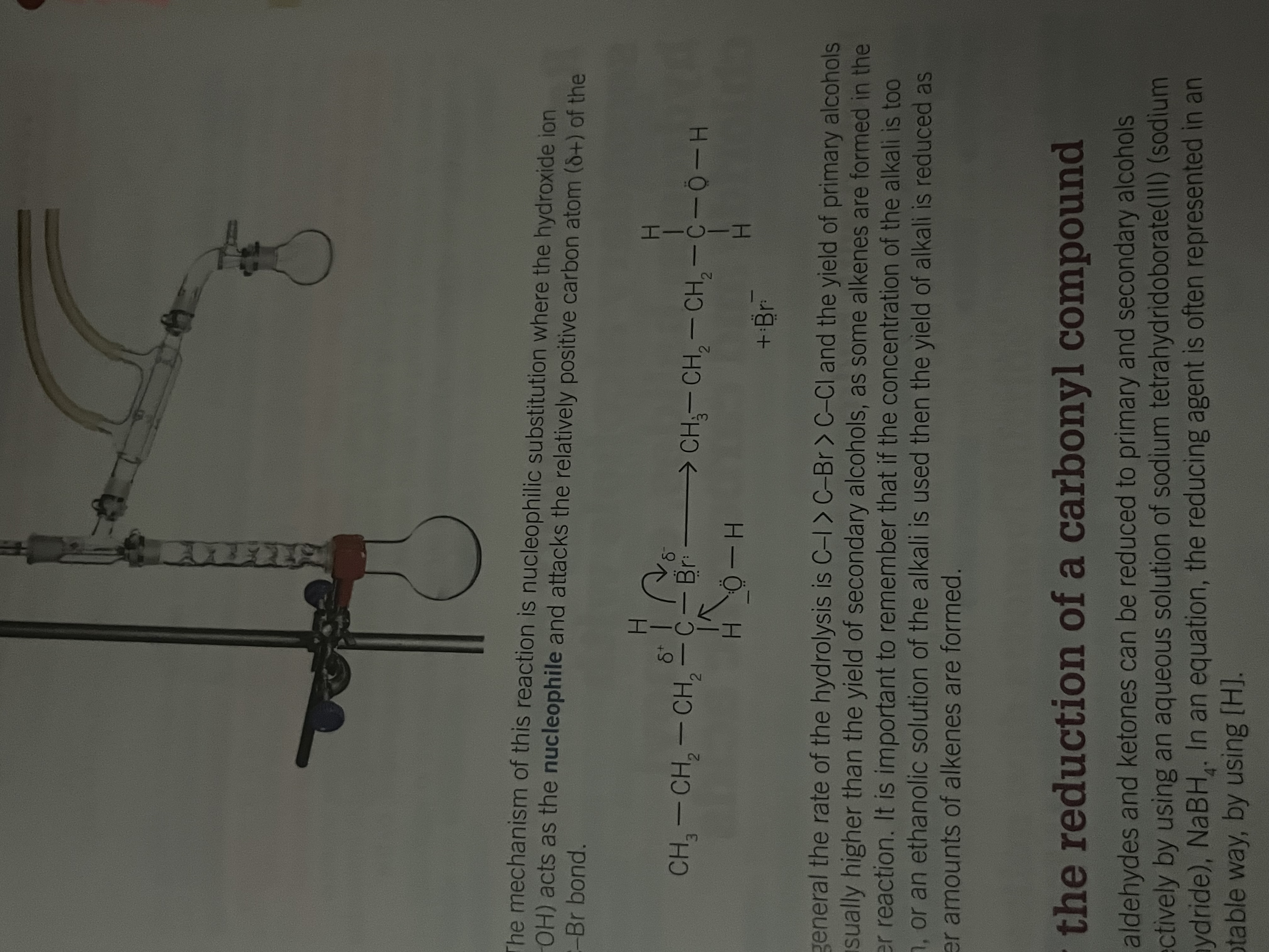 <p>CH3CH2CH2CH2Br + NaOH → CH3CH2CH2CH2OH + NaBr</p><p>nucleophilic substitution where the hydroxide ion acts as the nucleophile and attacks the relatively positive carbon atom on the C-Br bond</p><p></p>