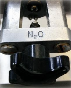 <p>Attachment point for cylinders of oxygen, nitrous, etc. These are specific, preventing the wrong cylinder being attached.</p>