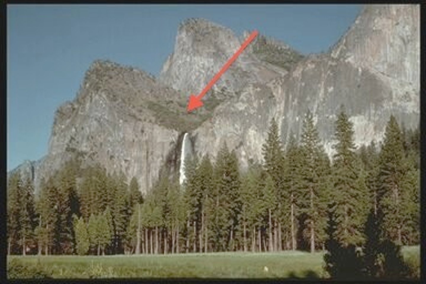 <p>A valley left by a melted tributary glacier that enters a larger glacial valley above its base, high up on the valley wall.</p>