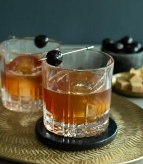 <p>Wild Turkey bourbon, sugar, orange bitters maple, amarena cherry</p>