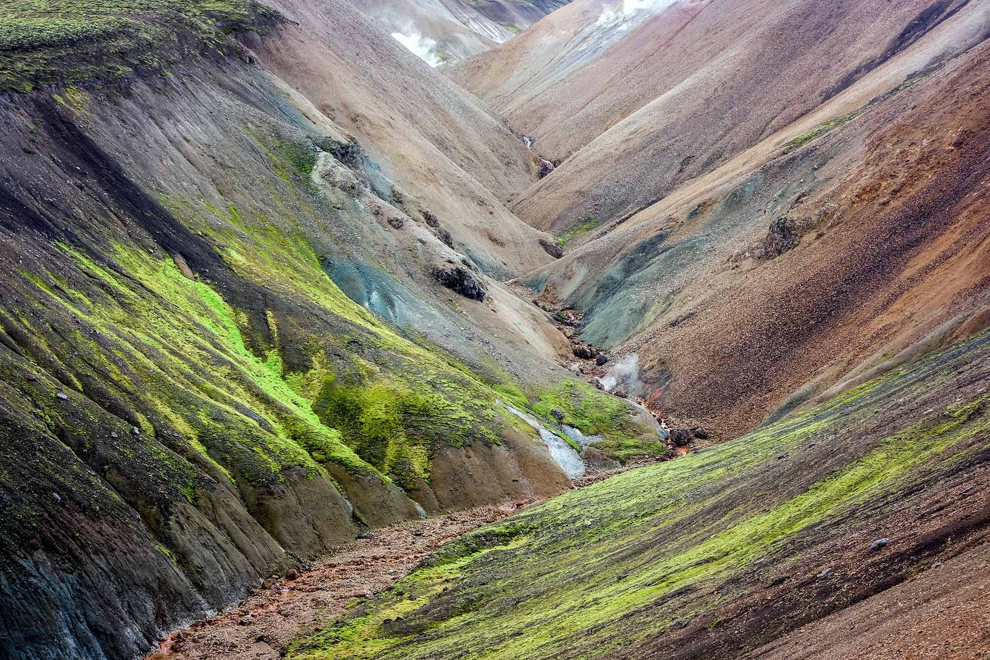 <p>through vertical erosion where due to the potential difference, the river erodes downwards </p>
