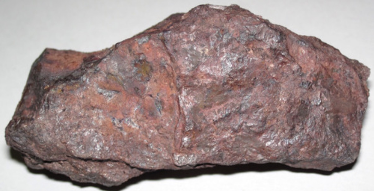 <p>Dusty red streak, uneven fracture, metallic luster. Black to reddish brown color. Important as iron ore. In soils, iron oxidizes primarily as amorphous coatings on other soil particles, but sometimes this mineral can occur in sand and silt fractions as crystals. Partially responsible for bright red and brown soil colors.</p>