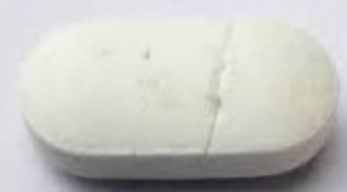 <ul><li><p>Presence of<strong> <u>fine cracks</u> around the surface</strong> <strong>of the tablet</strong></p></li><li><p>Due to:</p><ul><li><p><strong>Overcompression</strong> - pressured exerted by upper &amp; lower punch is too excessive</p></li><li><p><strong>Poor Granulation</strong> - can have excessive fine granules just like capping</p></li></ul></li></ul><p></p>