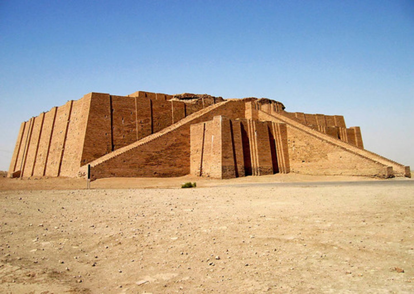 <p>Culture: Sumerian</p><p>Location: Ur (now southern Iraq)</p><p>Medium: Architecture</p><p>Structure: Massive rectangular pyramidal structure with three terraces and staircases</p><p>Function: Artificial mountain for worshiping gods in flat Mesopotamian landscape</p><p>Dedication: Built by King Ur-Nammu for Nanna/Sîn (moon god)</p><p>Historical Context: From Third Dynasty of Ur, last Sumerian-dominated period</p><p>The Ziggurat of Ur was used to worship the gods. Worship ceremonies both propitiated the gods and reinforced the divine mandate of the land's rulers. Each Ziggurat was dedicated to a different deity.</p>