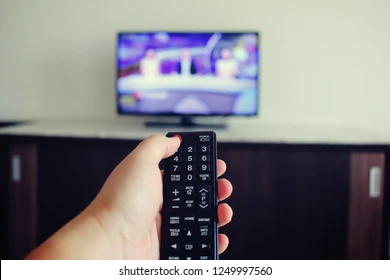 <p>Turn on the TV (v.phr)</p>