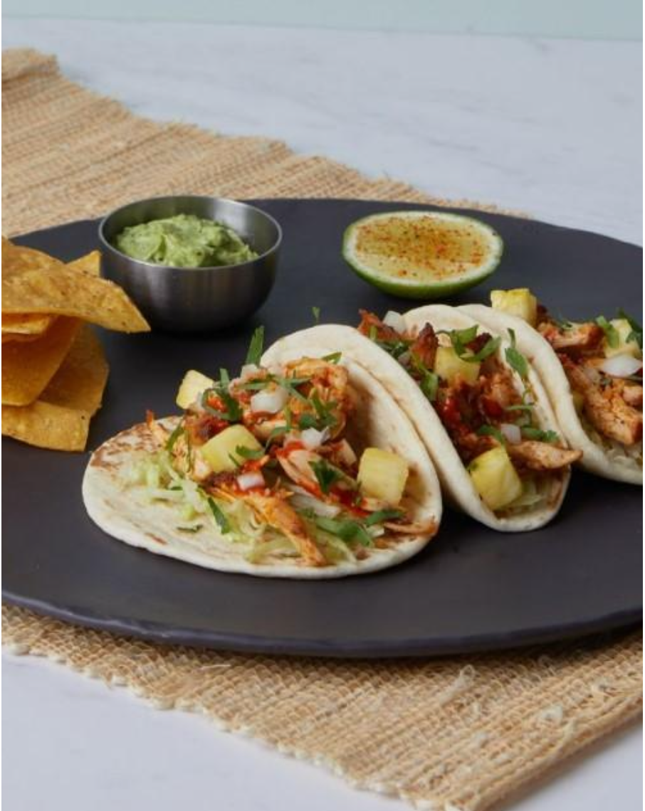 <p><span><em>Achiote braised chicken, pineapple, cilantro, avocado crema.</em></span></p><p><span>➔ Yellow onion<br>➔ Valentina garlic mayo</span></p><p><span>➔ Iceberg lettuce ➔ Corn crunch ➔ Tortilla chips<br>➔ Lime cheek<br>➔ Cajun rimming salt</span></p><p><span><strong>add sea salted fries</strong> <strong>+5¼</strong>| <strong>add fresh greens, kale salad, truffle fries, yam fries</strong> <strong>+5¾</strong></span></p>