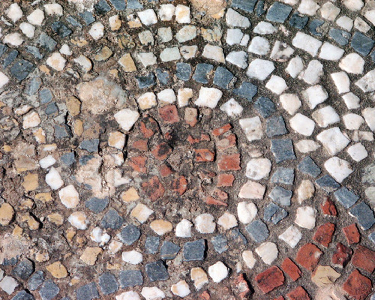 <p>the small piece of stone, glass, or other object that is pieced together with many others to create a mosaic</p>