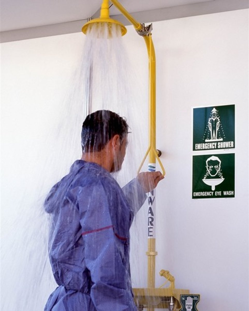 <p>Safety device used in case of an emergency to rinse off student using water; pull triangular handle to start water flow</p>