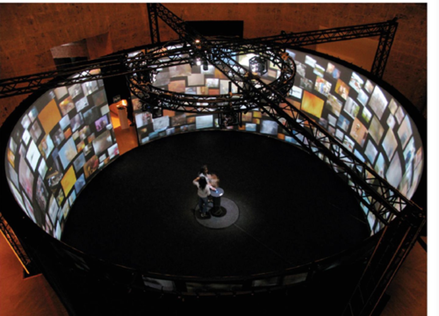 <p>Title: T-Visionarium II</p><p>Time: 2008.</p><p>Known for:</p><ul><li><p><em>T-Visionarium II</em> is an <strong>immersive, interactive multimedia installation</strong> that combines <strong>virtual reality, interactive art</strong>, and <strong>real-time data</strong> to explore the relationship between <strong>vision, perception</strong>, and <strong>technology</strong>.</p></li></ul><ul><li><p>Explores the idea of <strong>hyperreality</strong>, where the boundaries between <strong>the real world</strong> and <strong>virtual spaces</strong> are increasingly blurred, and it raises questions about <strong>how technology can influence our sense of self</strong>, <strong>awareness</strong>, and <strong>perception of reality</strong>.</p></li></ul><p></p>