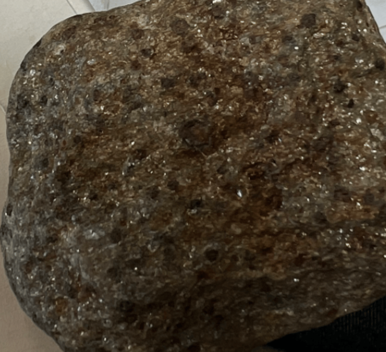 <p>Test the hardness of the rock using a common tool like a fingernail or a pocketknife. Mica minerals have a relatively low to moderate hardness and can be easily scratched. Additionally, mica minerals exhibit a distinct basal cleavage, meaning they can be easily split into thin, flexible sheets along specific planes.</p>