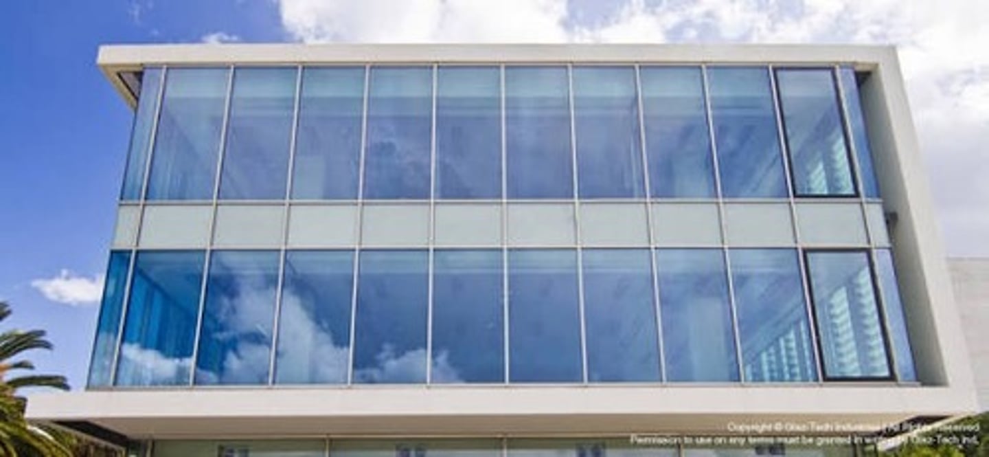 <p>An opaque glass for concealing the structural elements in curtain wall construction</p>