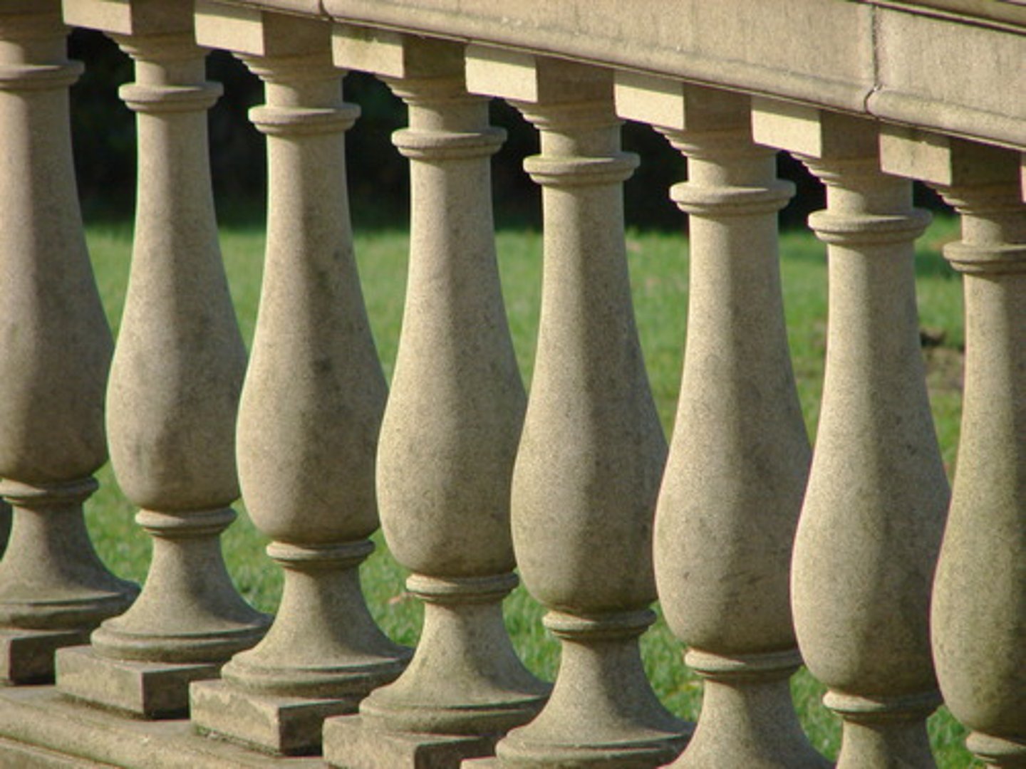 <p>A small turned, square or flat column that supports a rail. Also used to form chair backs.</p>