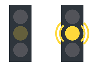 <p>A yellow traffic light blinking</p>
