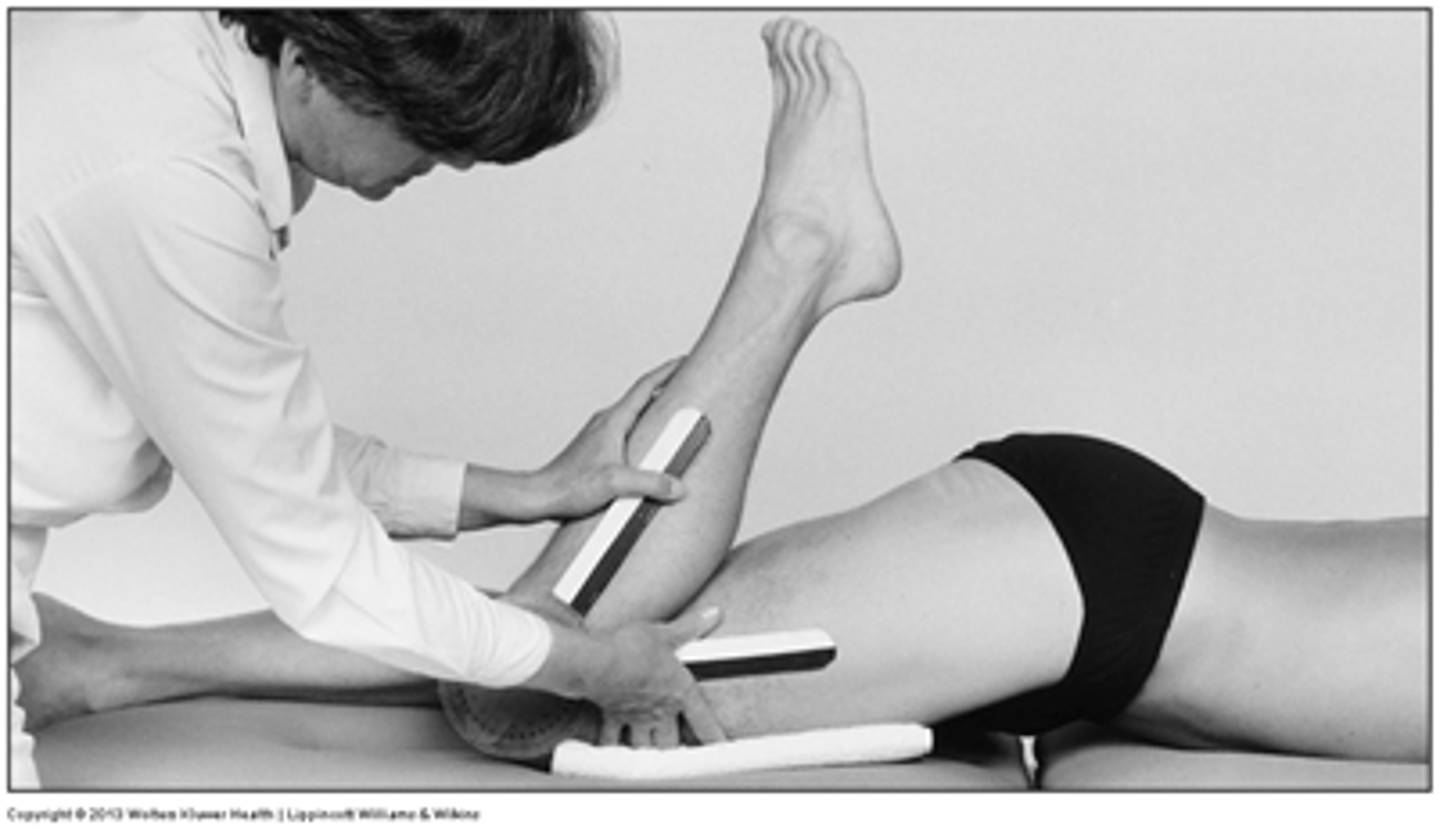<p>fulcrum: lateral epicondyle of femur<br>proximal: lateral midline femur<br>distal: lateral midline fibula<br><br>* prone<br>* bring knee to butt<br><br>COMPARE TO NORMAL KNEE FLEXION (supine)</p>