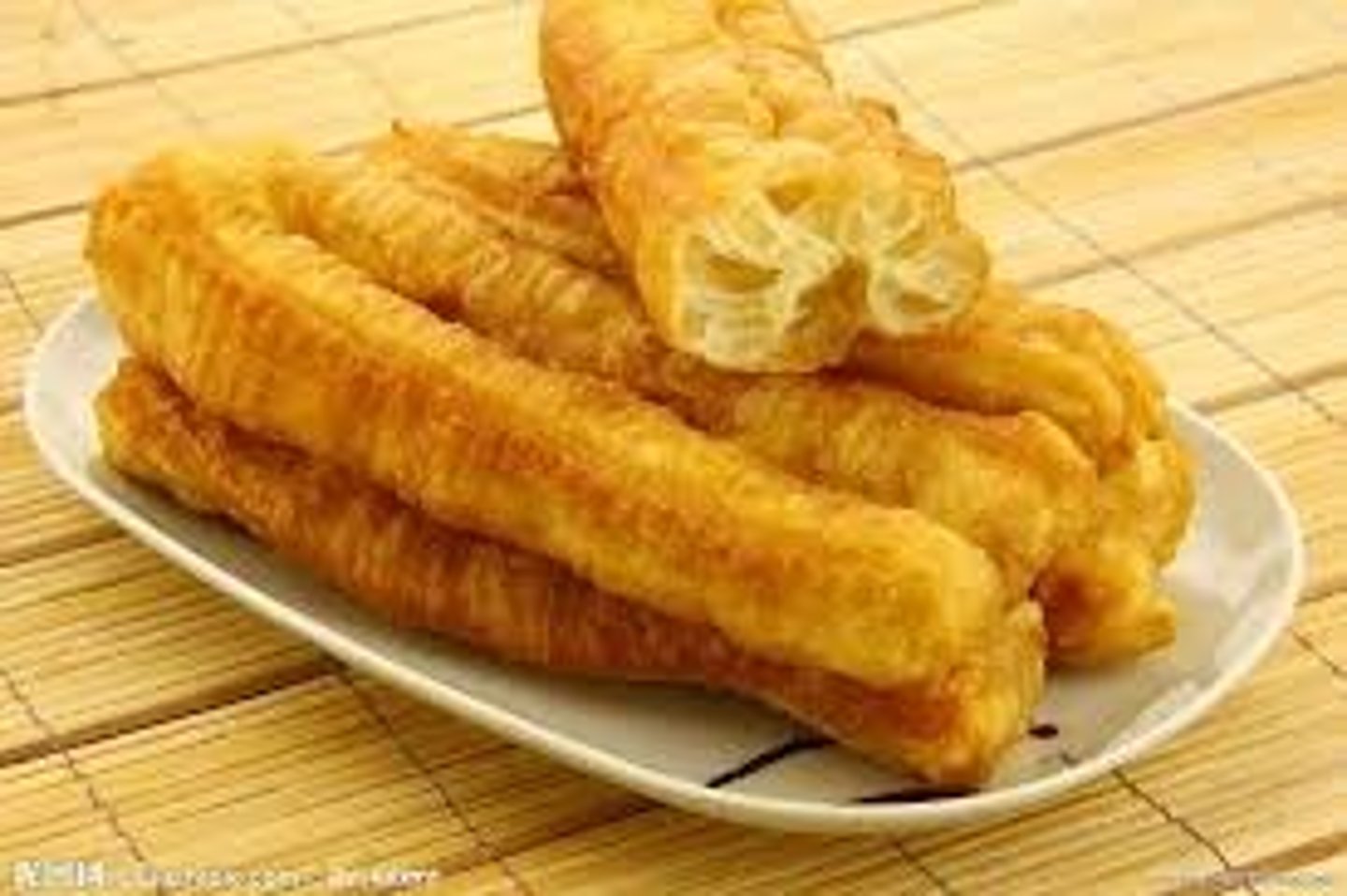 <p>yóutiáo - deep-fried dough sticks</p>