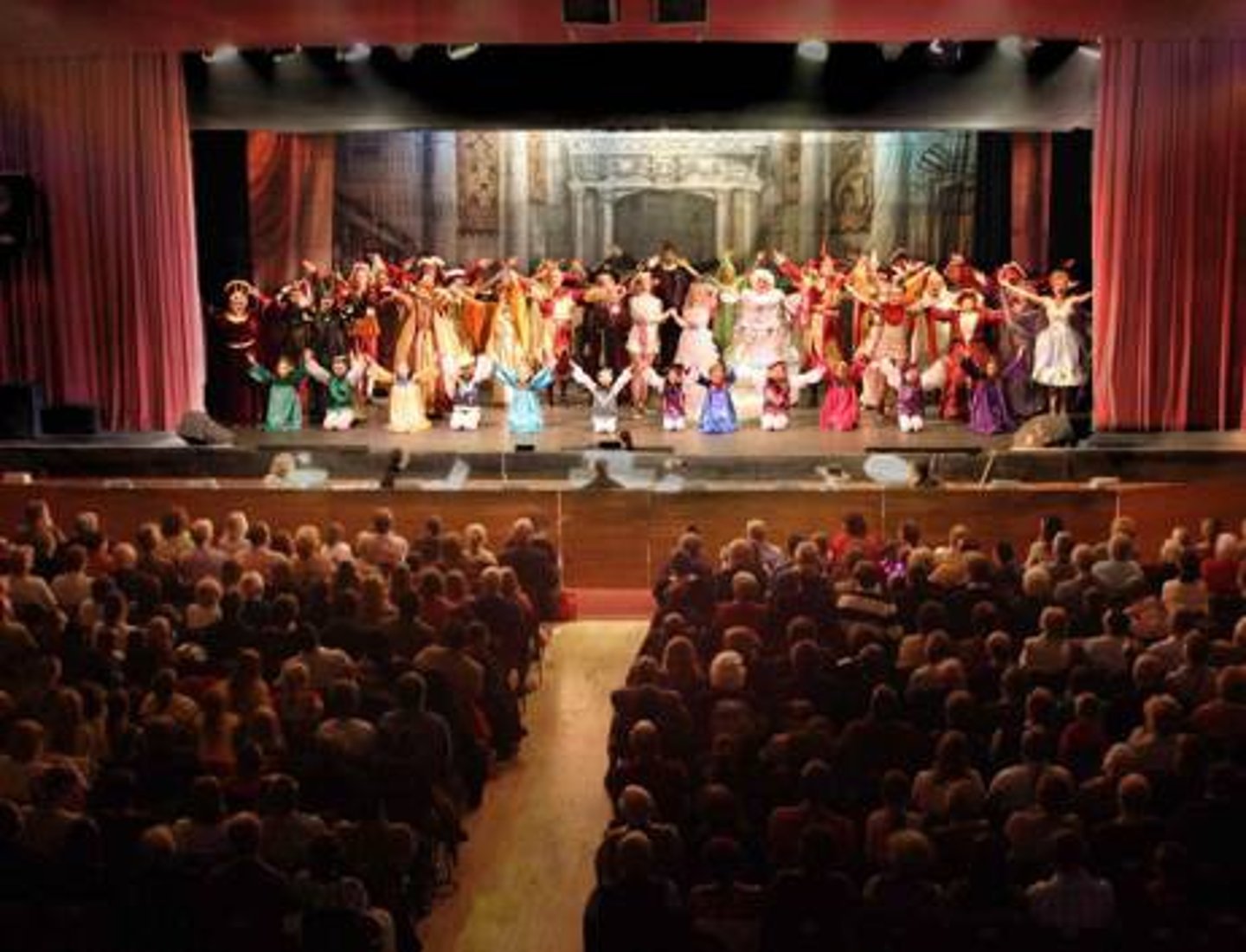 <p>to see a play/show</p>
