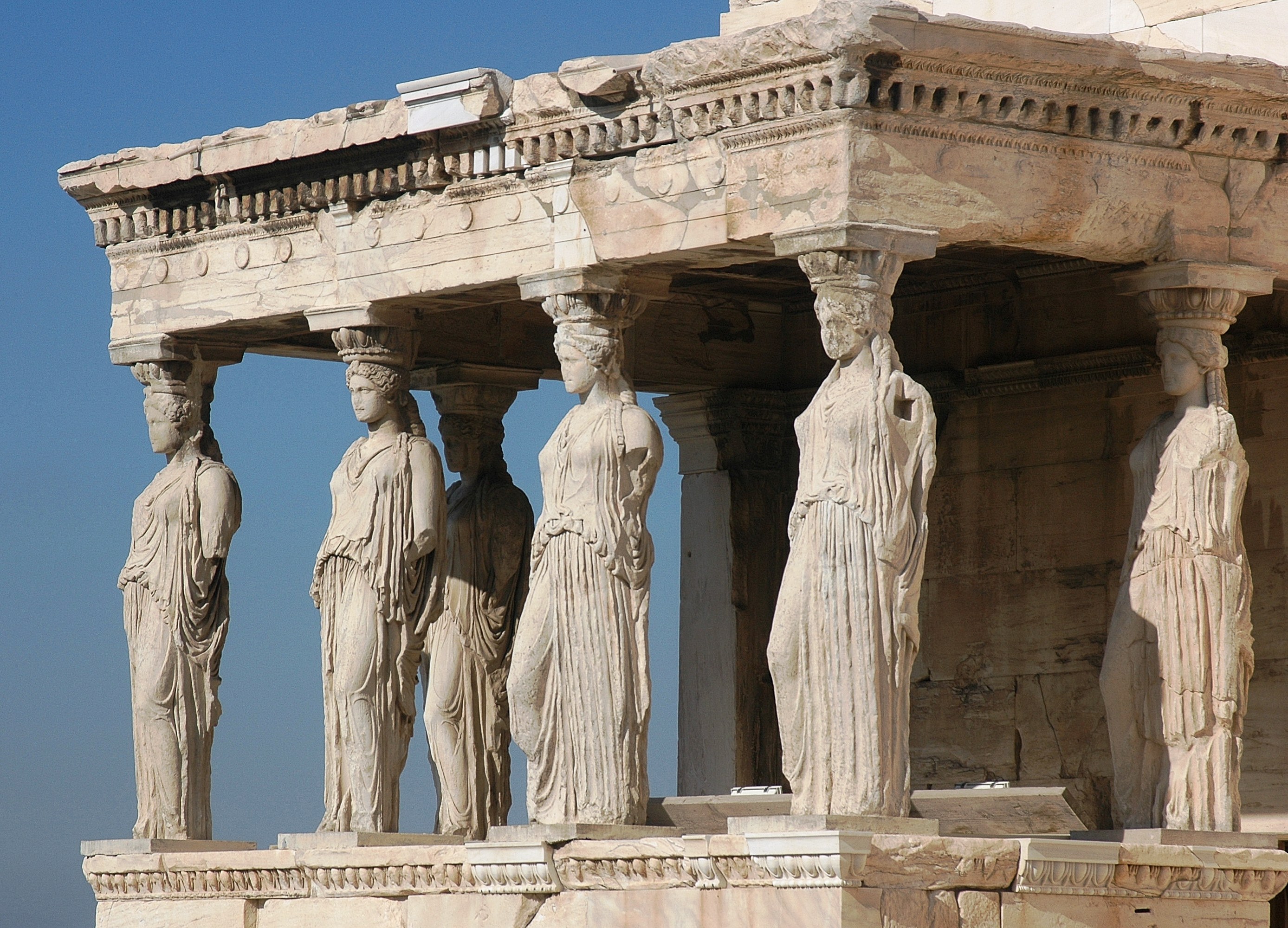 A statue of A woman used as a column