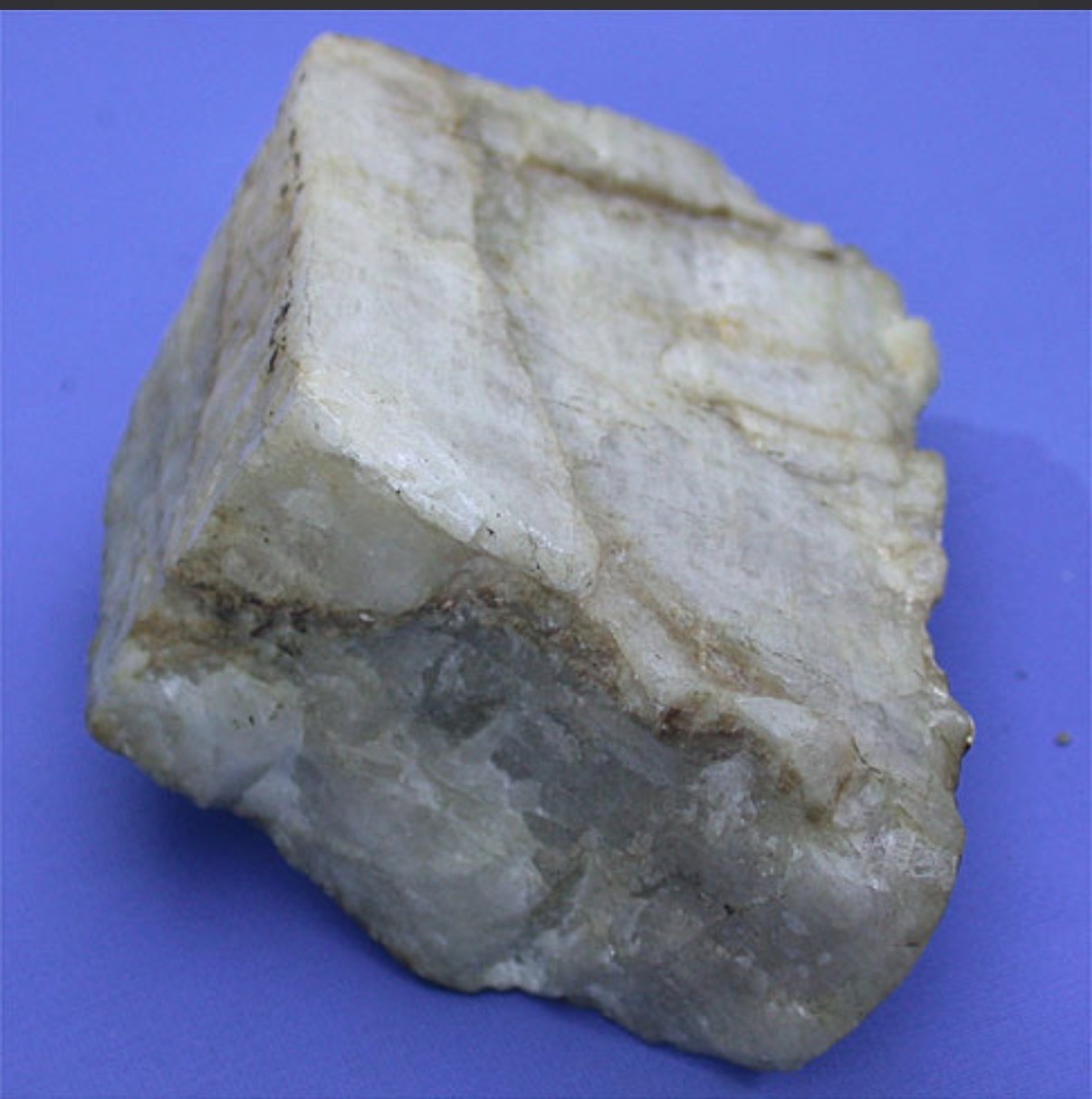 <p>Feldspar, colorless streak, good cleavage/fracture in 2 directions at 94°, vitreous to pearly luster, colorless/white/red/gray color. Forms a series from the Na type (albite) to the Ca type (anorthite). All have striations on the basal cleavage plane. </p>
