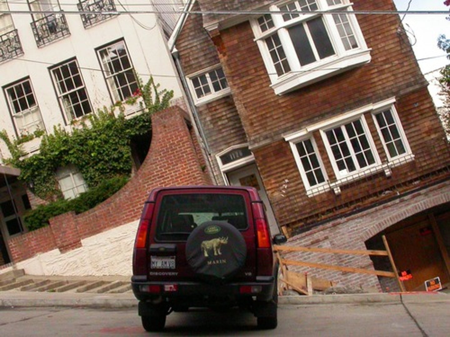 <p>(adj., adv.) twisted to one side, crooked; disapprovingly</p><p>SYNONYMS: awry, lopsided, cockeyed</p><p>ANTONYMS: straight, symmetrical</p>