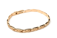 <p>a piece of jewelry that is worn around the wrist or arm</p>