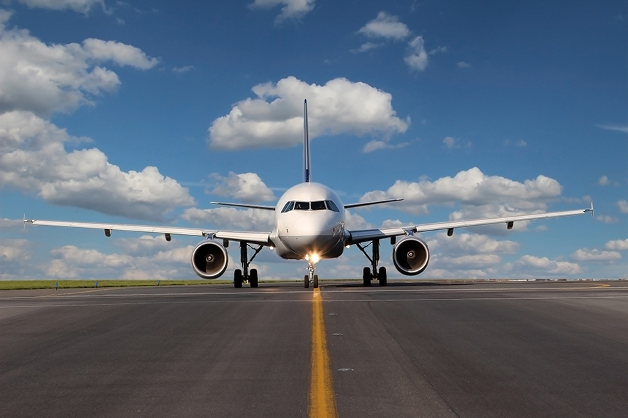 to move slowly on the ground before takeoff and after landing