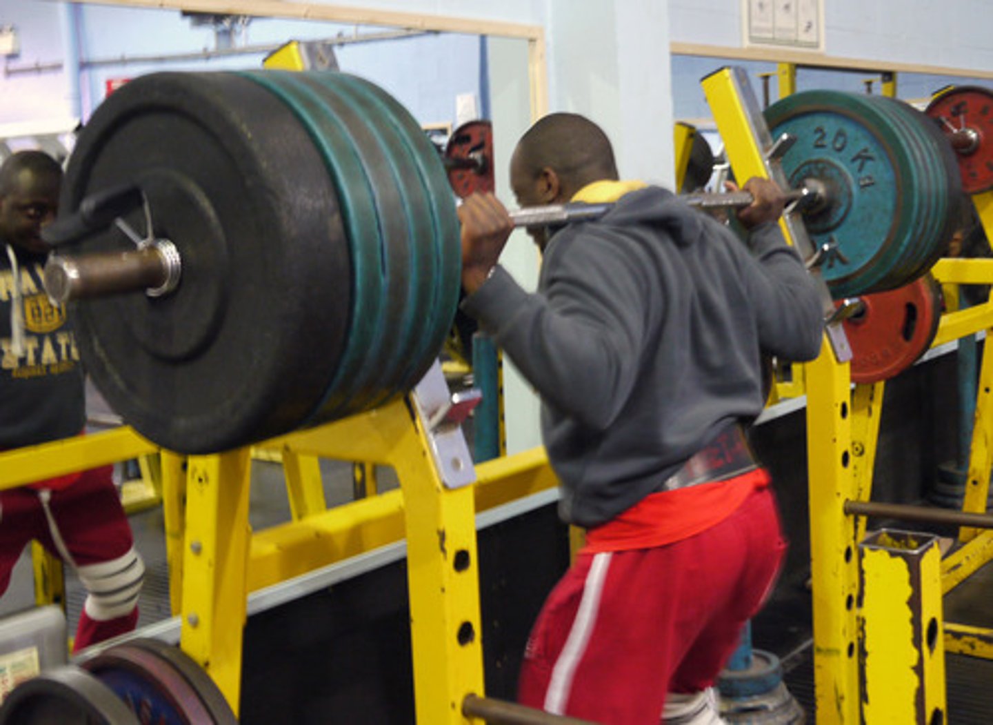 <p>lifting weights to increase strength, power, and muscular endurance</p>
