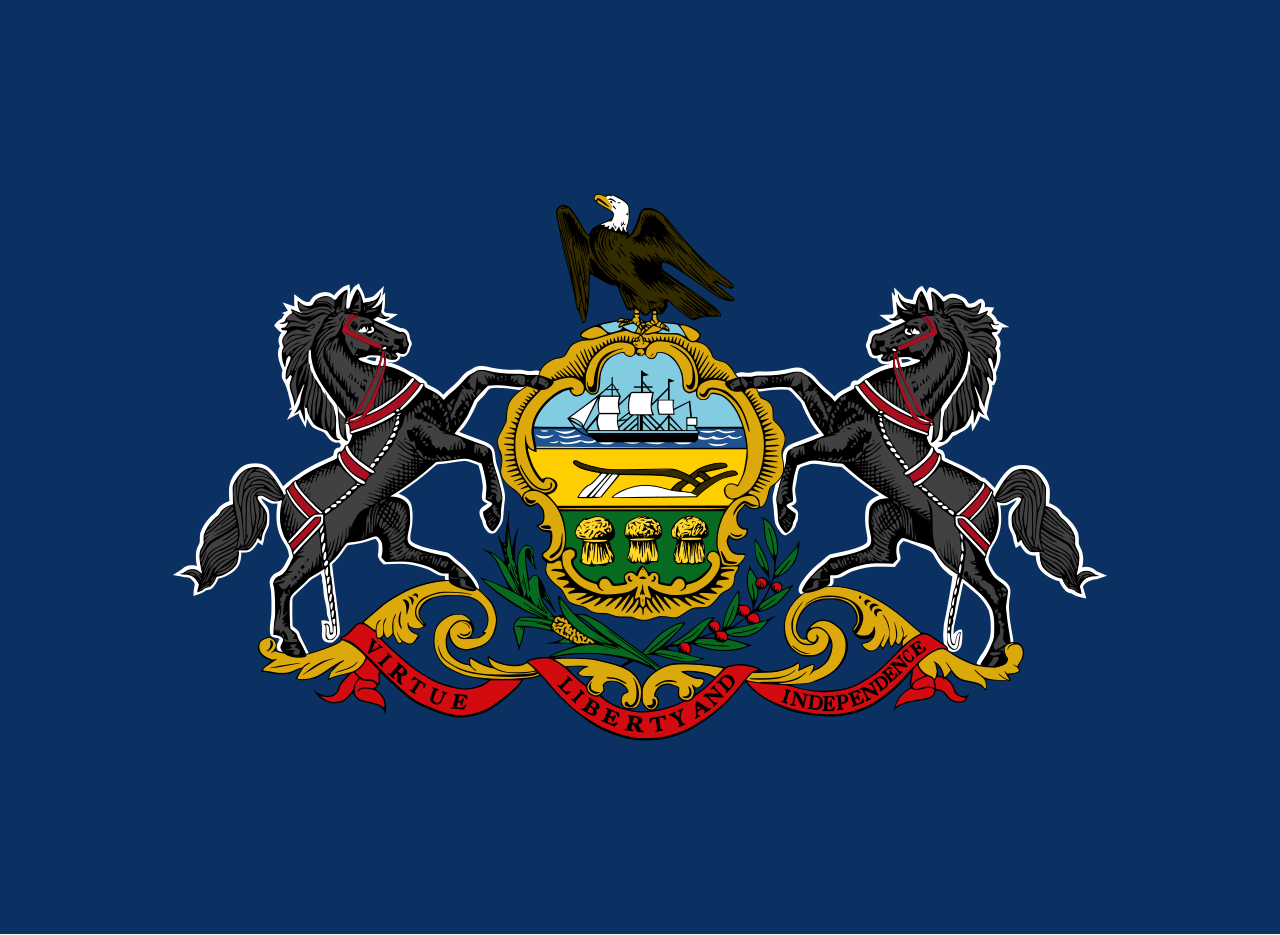 <p>Navy blue background with a coat of arms featuring two horses, an eagle and a ship. Virtue, liberty and independence on a red banner.</p>