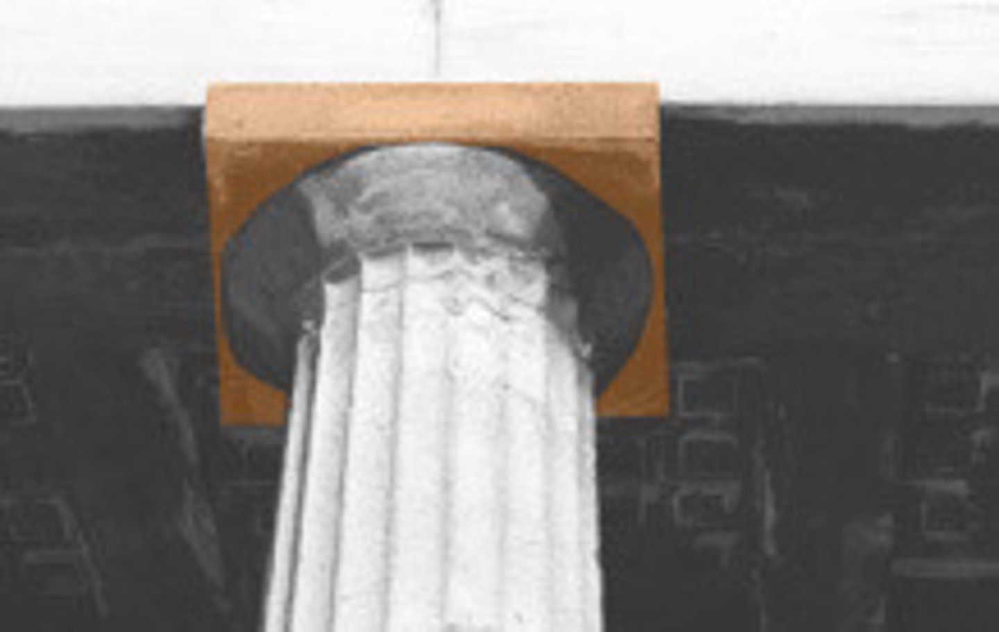 <p>At the top of a capital, a thick rectangular slab of stone that serves as the flat, broad surface on which the architrave rests.</p>