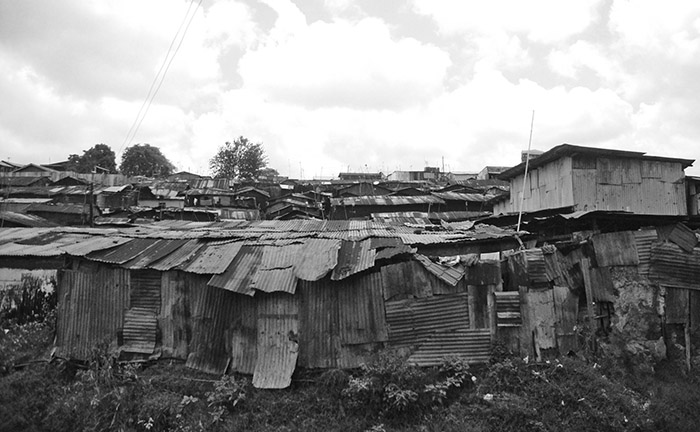 <p><span>The construction of makeshift housing in a country within the periphery, as shown in the photograph, is often the result of</span></p><p><strong>A</strong></p><p>natural disasters that moved through the area, damaging homes</p><p><strong>B</strong></p><p>government housing projects that were neglected as a result of government corruption</p><p><strong>C</strong></p><p>an increasing number of industrial jobs available in a city without adequate housing</p><p><strong>D</strong></p><p>too few schools and an increasing number of informal labor market jobs for children</p><p><strong>E</strong></p><p>an increasing number of service-sector jobs available only to workers who have been highly educated</p>