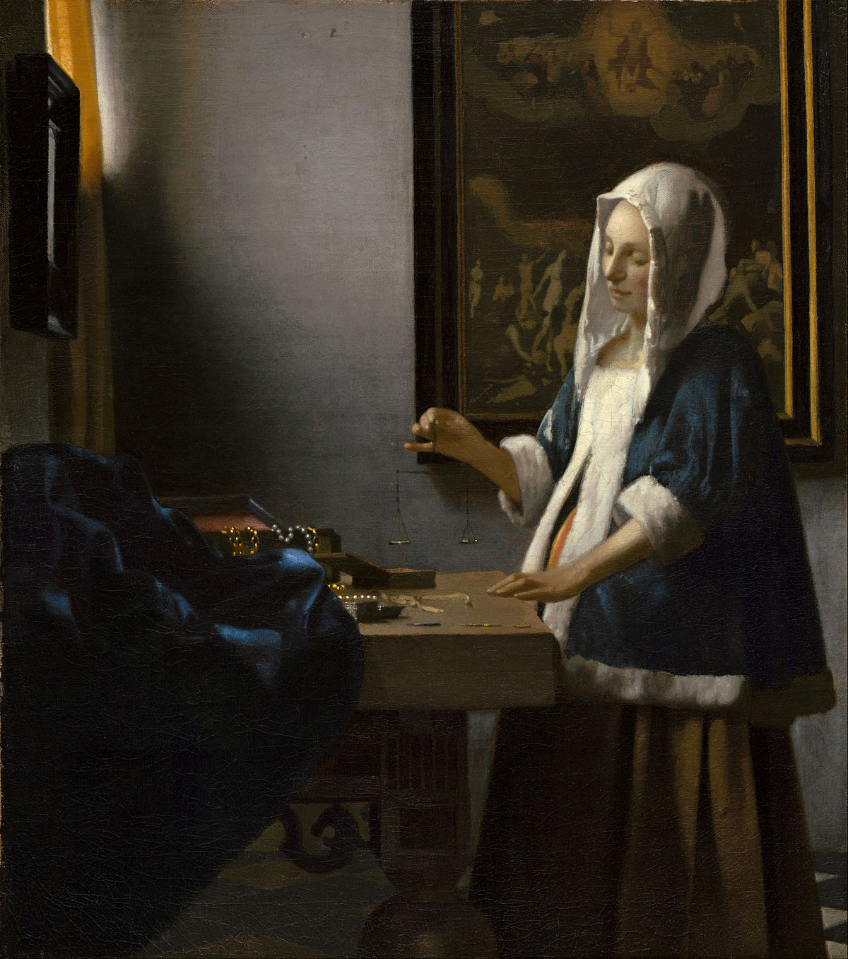 <p>Woman Holding a Balance</p>