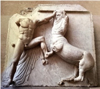 * Shows a lapith and a centaur mid struggle ​
* The lapith has raised his left leg to kick the centaur before him and his right arm is drawn back and is poised to hit the centaur on the head with a stone ​
* His left arm is stretched holding the centaur back to position the strike ​
* His weight rests on the ball of his foot indicating a spring in his attack ​
* His body is turned outwards so that we can see his muscular torso 