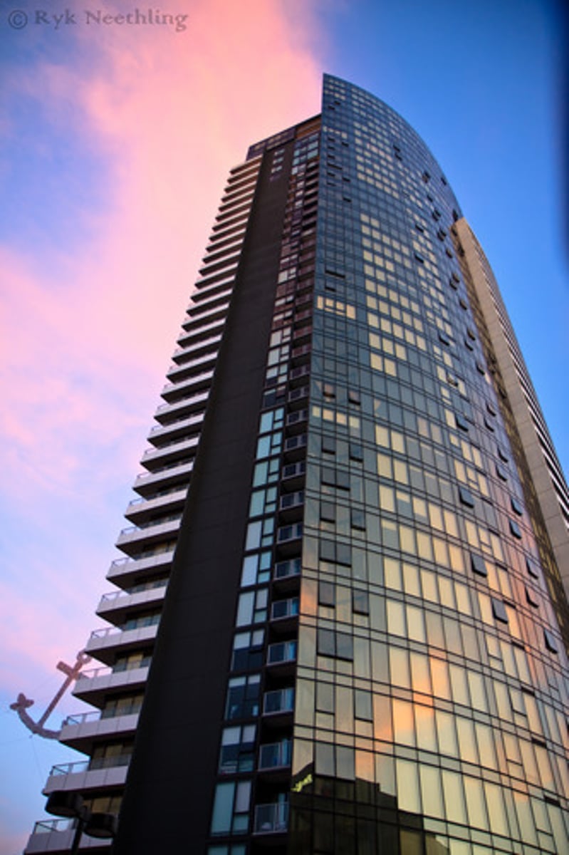 <p>Building up a city instead of out, like tall buildings.</p>