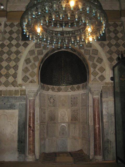 <p>Great Mosque of Qairawan, Tunisia, 9th century, Aghlabid Dynasty</p><p>- With its hypostyle plan on spolia columns, the stone mosque could easily be expanded</p><p>- The mihrab was exquisitely ornamented. It had pierced marble panels in the curvature of the niche and golden lustre tiles embedded in its frame</p><p>- The dome overhead is fluted — sometimes described as a pumpkin dome because of its sensuously curved ribbed external surface.</p>