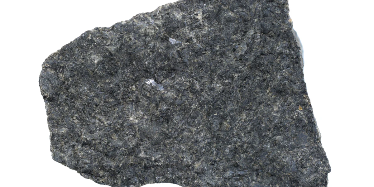 <p>PLUTONIC. Setting: oceanic crust, plutons. Composition: mafic. Minerals: pyroxene, plagioclase.</p>