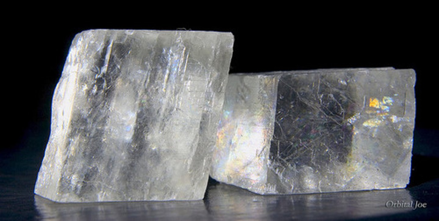 <p>appearing iridescent, similar to a natural pearl or seashell (mica)</p>