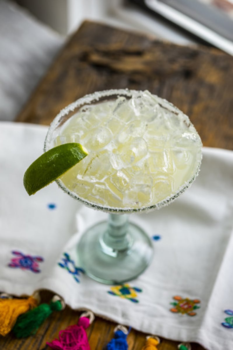 <p>Top Shelf Margarita (off-menu, Guest favorite)</p><p>- 1800 Reposado tequila</p><p>- Grand Marnier</p><p>- Fresh lemon and lime juices</p><p>Garnish: Lime wedge, kosher salt rim</p><p>Flavor profile: Light and refreshing</p><p>Selling description: Our traditional margarita crafted with 1800 Reposado and Grand Marnier, offered frozen or on the rocks.</p><p>Served frozen or on the rocks.</p><p>Regular or grande size available.</p>