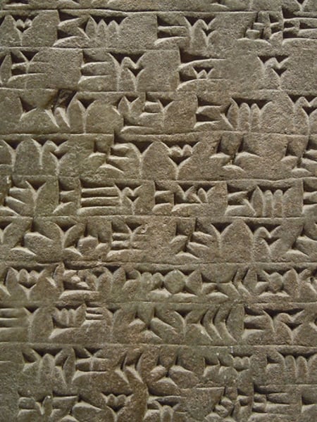 <p>A system of writing in which wedge-shaped symbols represented words or syllables. It originated in Mesopotamia and was used initially for Sumerian and Akkadian but later was adapted to represent other languages of western Asia.</p>