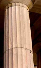 <p>Shallow grooves carved into pillars </p>